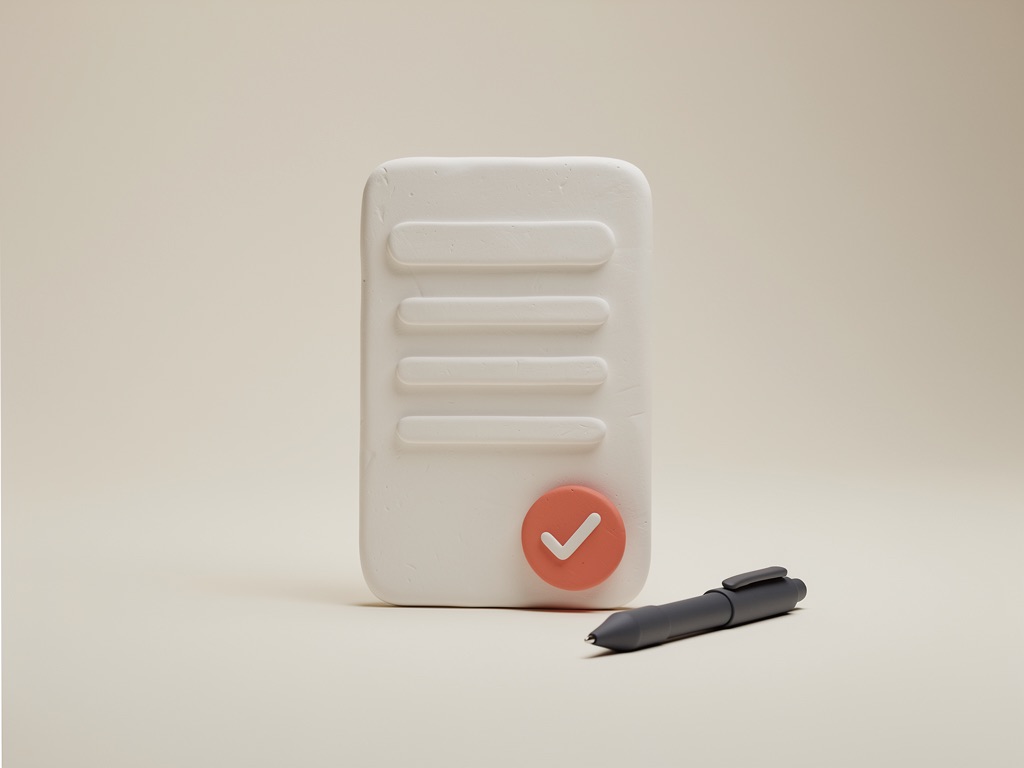 A clay quote card with a coral tick stamp and a pen